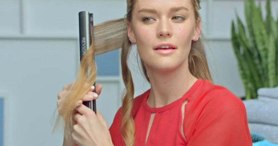 woman with long blonde hair wearing a red shirt, <a href='https://www.makertechlab.com/motor-servo-pin-configuration-for-arduino' target='_blank' rel='follow'>using</a> a flat iron to curl her hair” width=”912″ height=”479″></p>
<p>For a limited time, hop over to <a href=