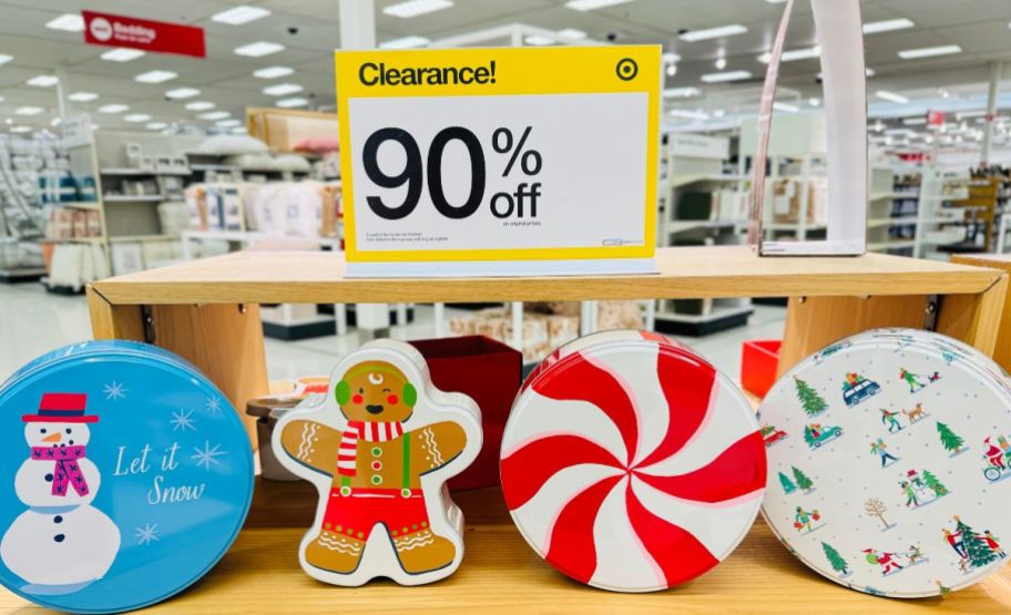 holiday gift tins on a display table in a target store