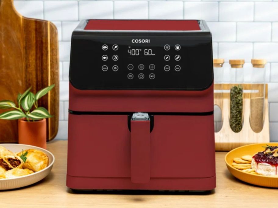 Cosori Pro II 5.8-Quart Smart Air Fryer in Red on counter