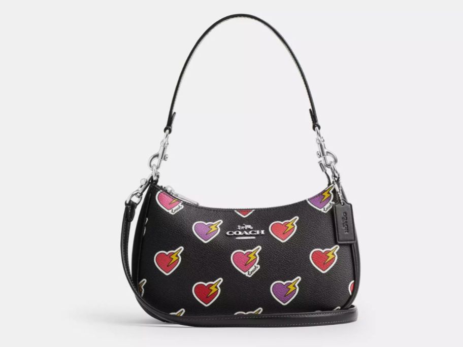 Coach Teri Shoulder Bag w/ Heart Bolt Print stock image