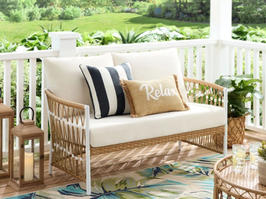 Better Homes & Gardens Lilah Outdoor Wicker Loveseat on patio