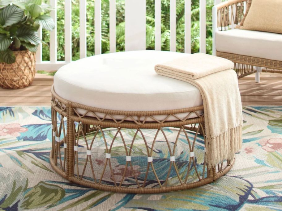 Better Homes & Gardens Lilah Outdoor Wicker 36" Round Ottoman on patio