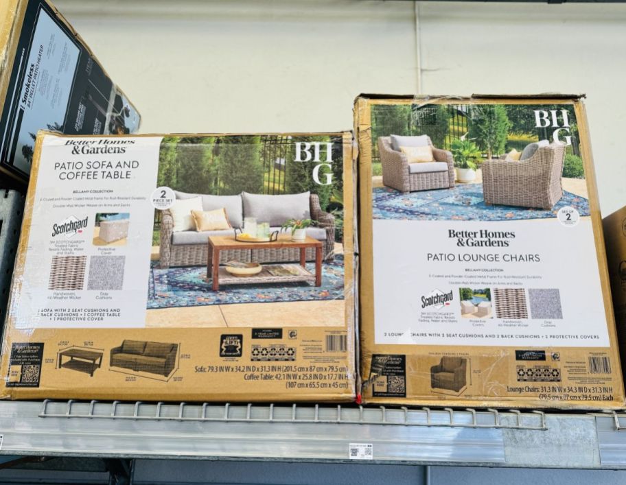 two wicker patio sets in boxes on a store shelf