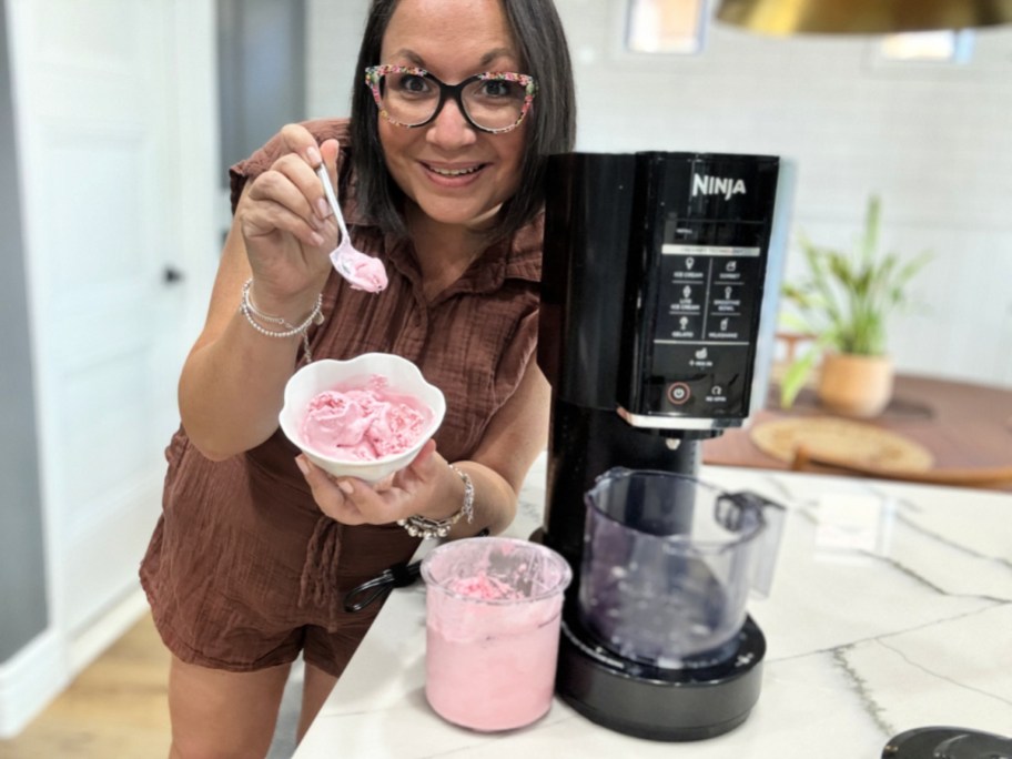 woman making strawberry ice cream in the ninja creami (1)