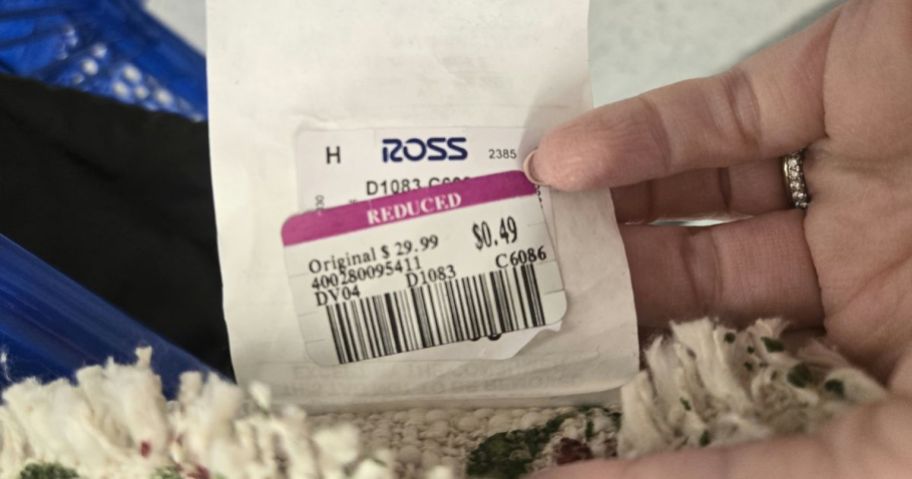 ross sales tag in hand in store