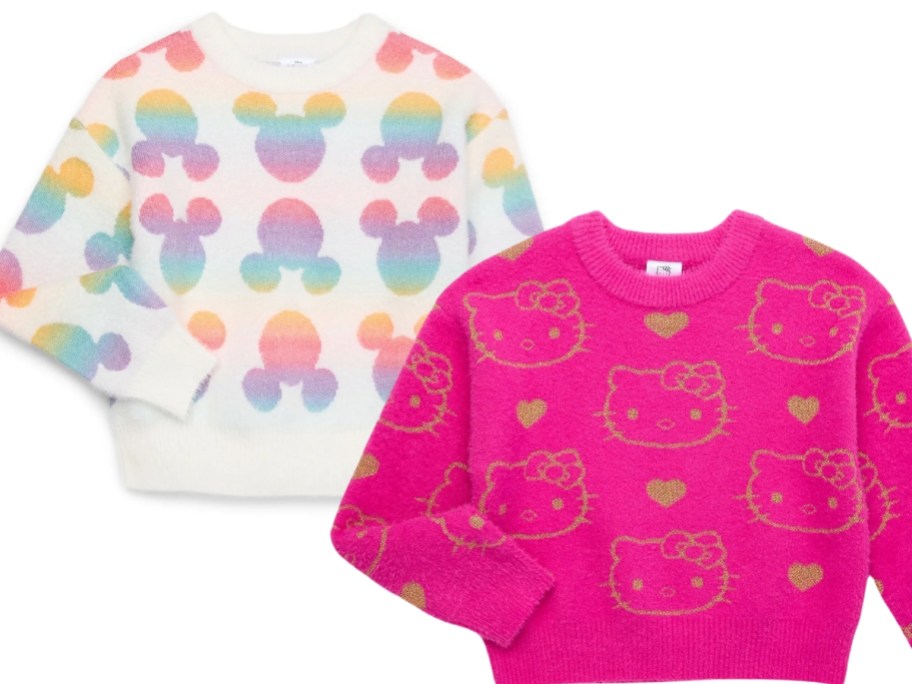 2 girls sweaters, one is white with multi-color Disney Mickey Mouse heads on it, the other is pink with gold Hello Kitty heads on it