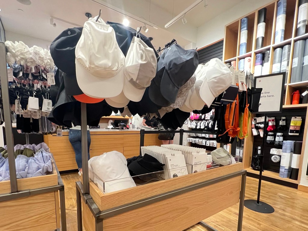 lululemon hats on display in store