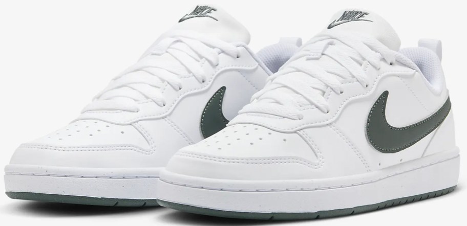 white and green nike shoes 