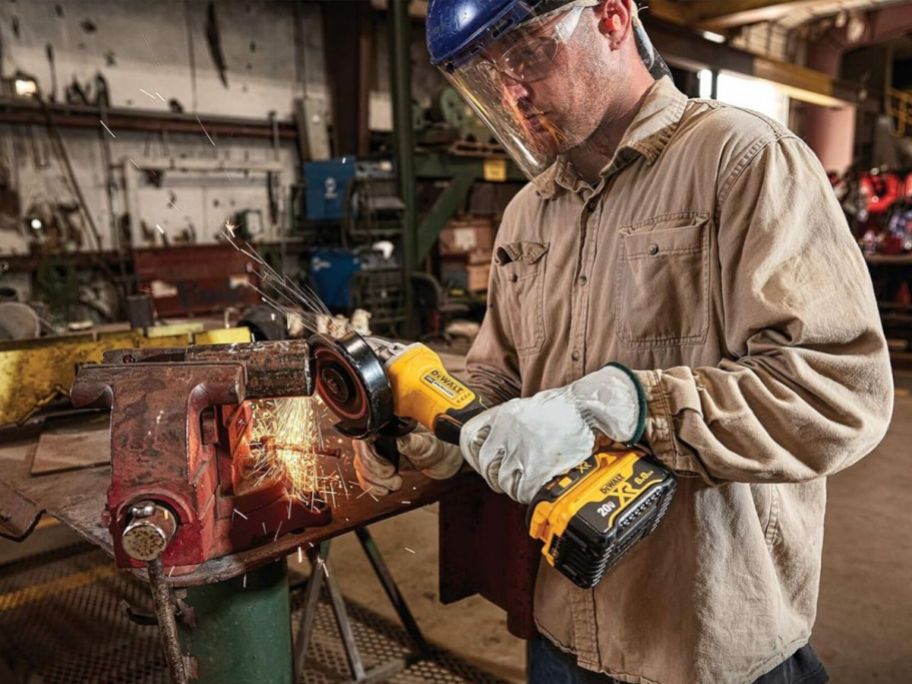 person using DeWalt 20V Max Angle Grinder Tool