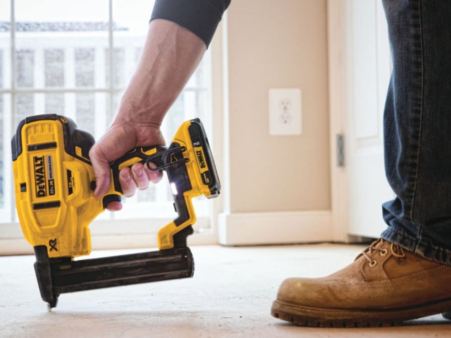 person using DeWalt 20V Max Narrow Crown Stapler