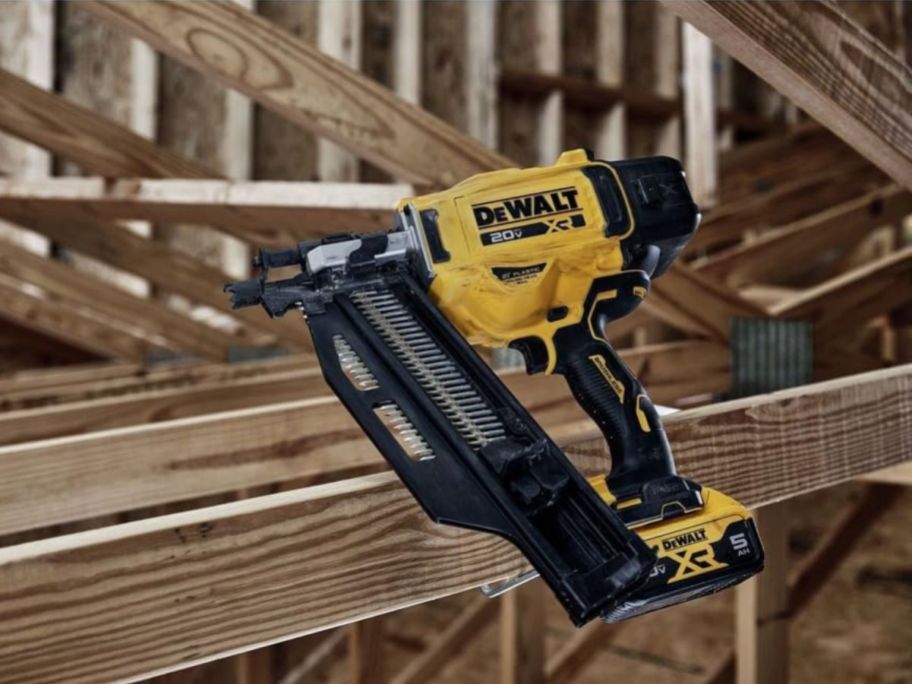 DeWalt 20V Max Brushless Lithium-Ion 3-Degree Cordless Paper Tape Framing Nailer on wood