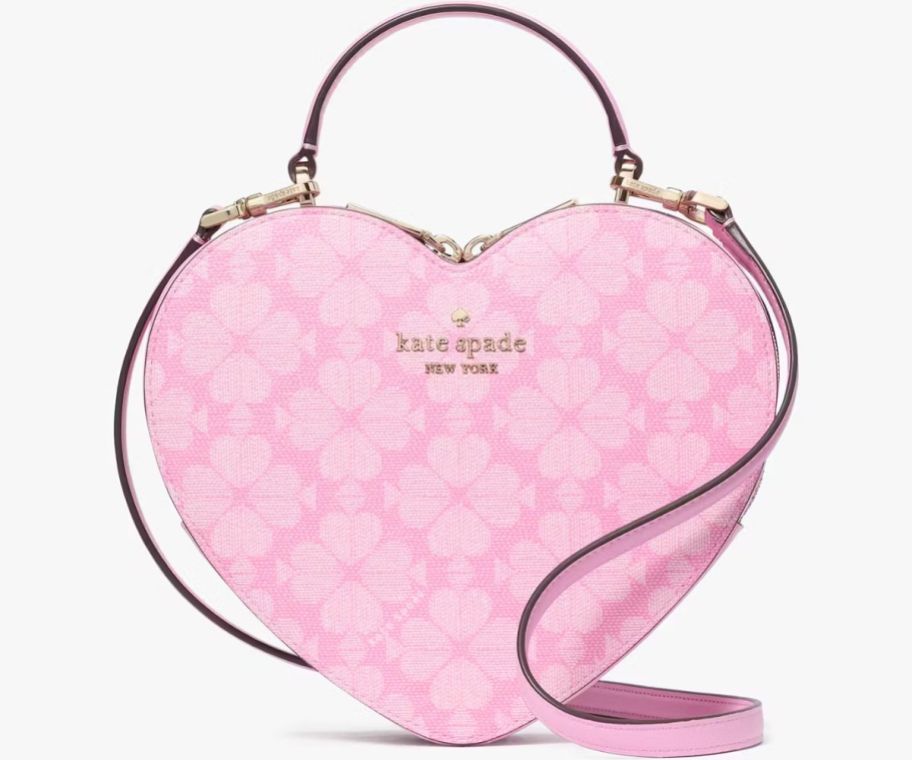 a pink heart-shaped crossbody bag