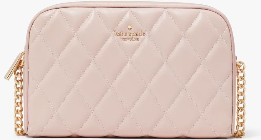 a blush pink quilted crossbody bag