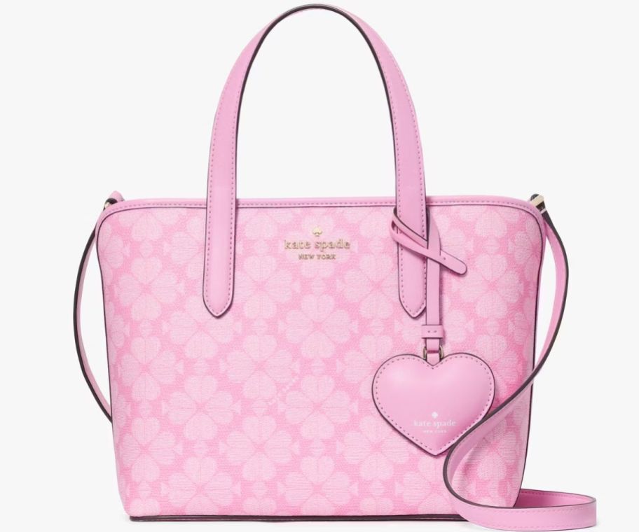 a small pink tote with a dangle heart tag