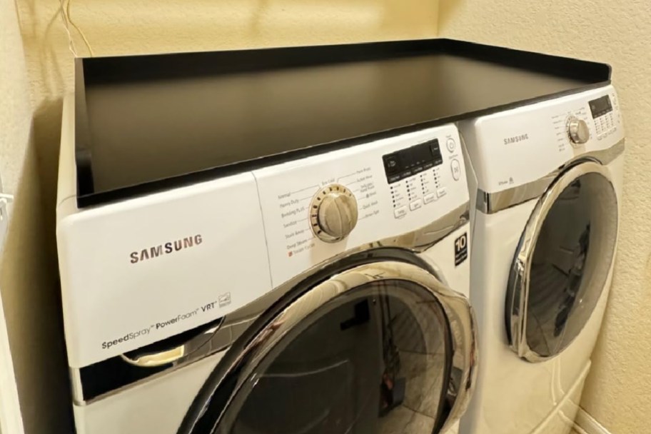 black marble shelf on washer dryer