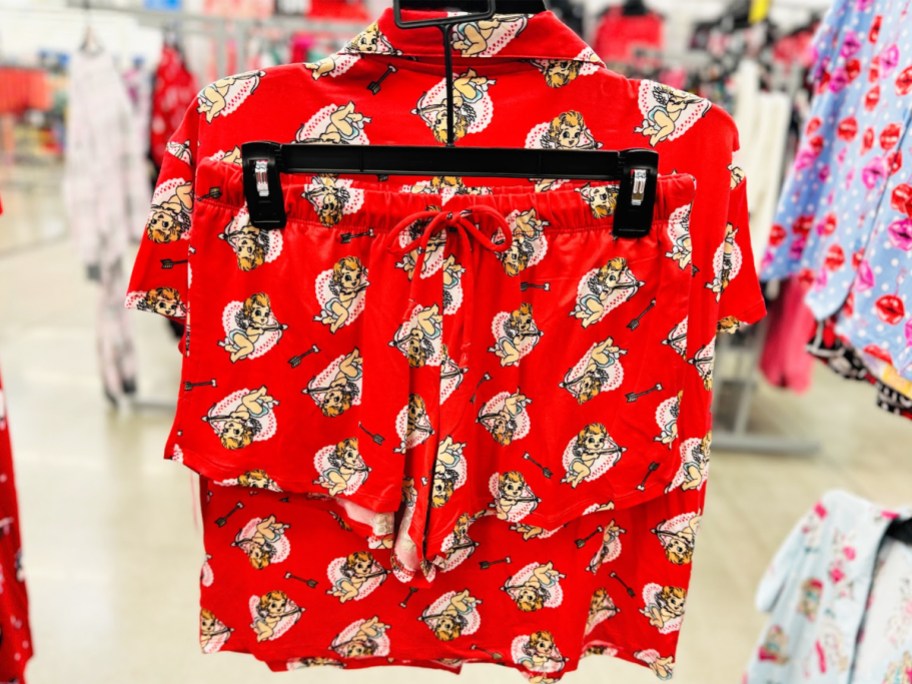 matching set of red cupid pajama shirt and shorts on hanger