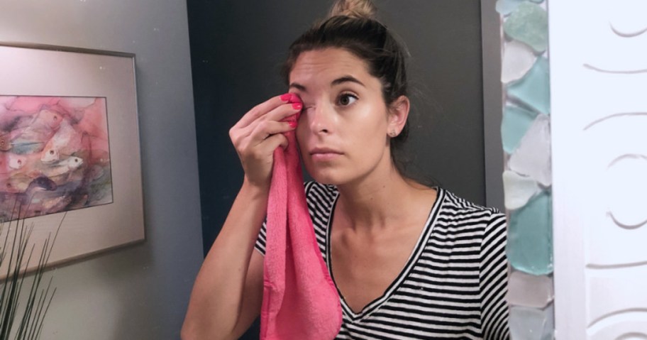 woman using pink Makeup Eraser