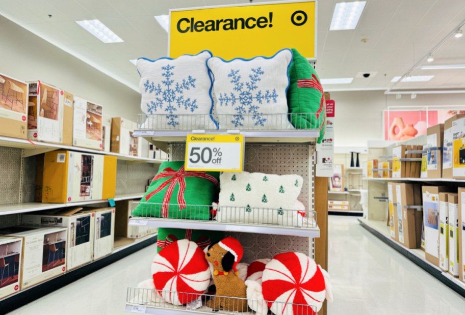 Christmas items on clearance on a Target store rack