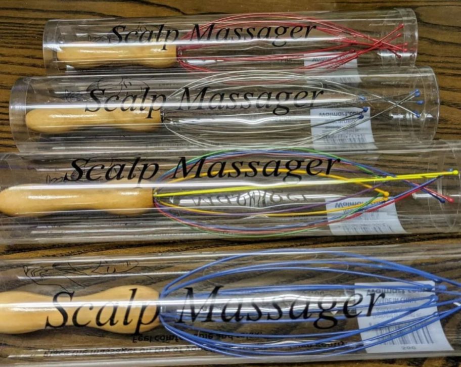 A number of Scalp Massagers on a table