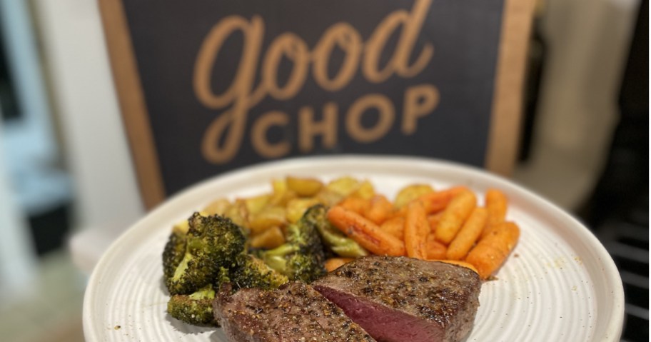 Steak meal on plate with Good Chop box in background