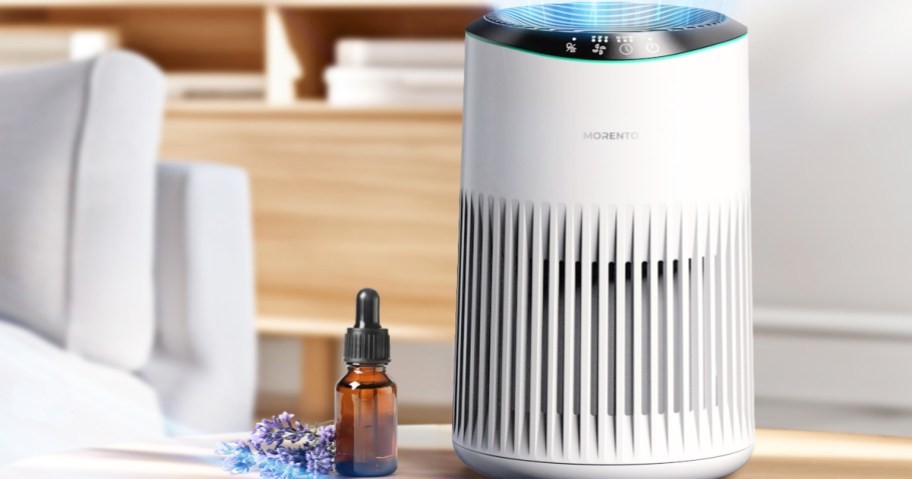 white morento air purifier sitting on coffee table