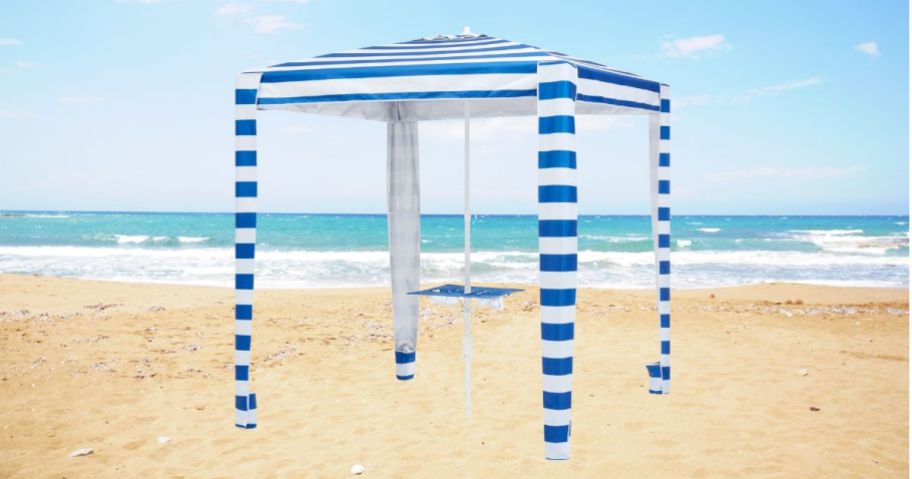 Mainstays 6' Blue & White Stripe Beach Umbrella Canopy on beach