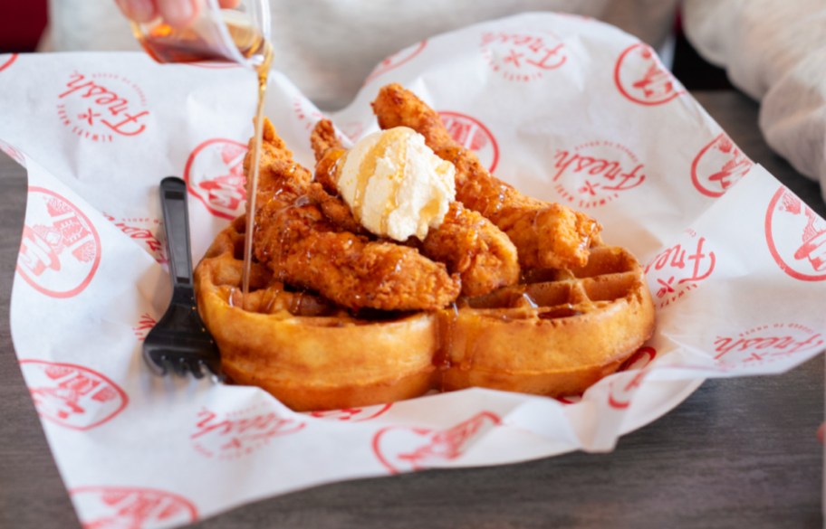 chicken and butter on heart shaped waffle