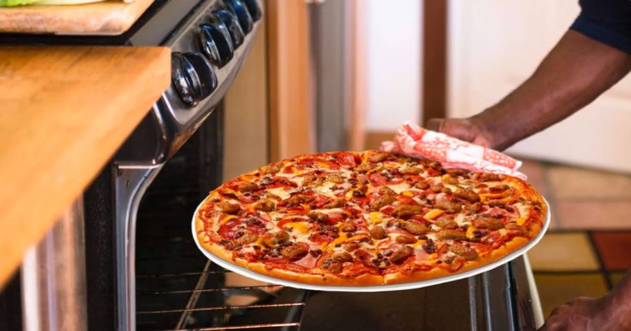 man putting a papa murphy's meat pizza in a <a href='https://online-shopping.fun/amazon-basics-the-smart-choice' target='_blank' rel='follow'>home</a> oven” width=”912″ height=”479″></p>
<p>Through February 24th, head over to <a href=