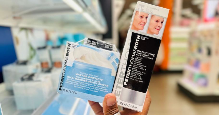 A person holding Peter Thomas Roth products