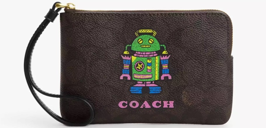 black coach wristlet with a green robot