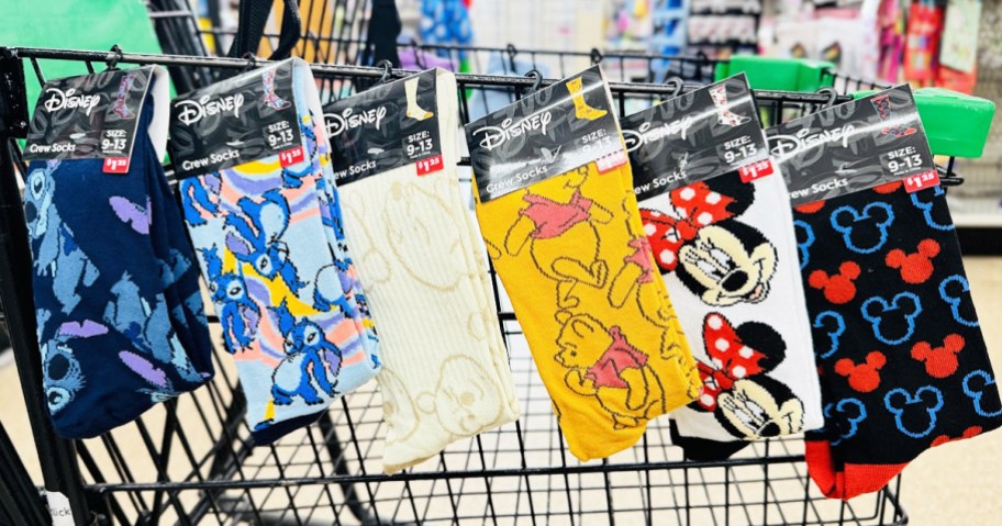 6 pairs of Disney Socks hanging from shopping cart