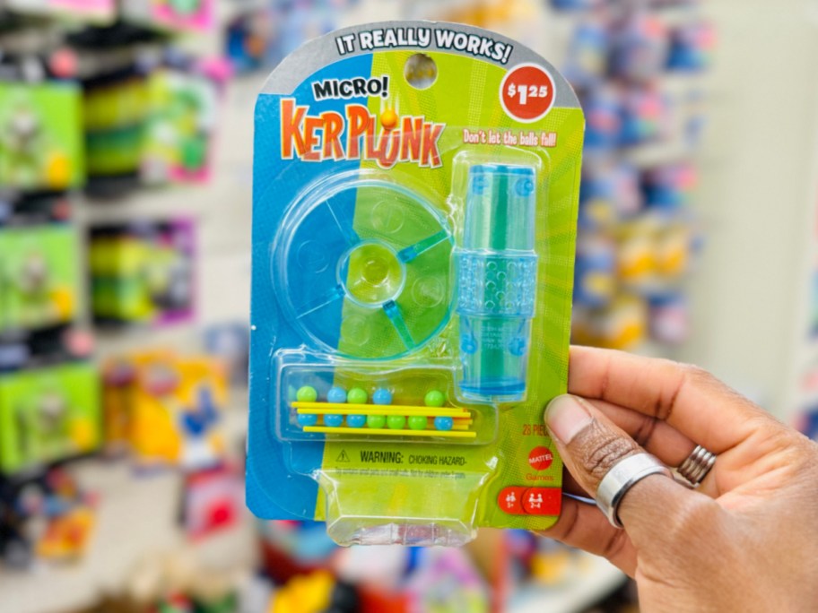 hand holding kerplunk mini game