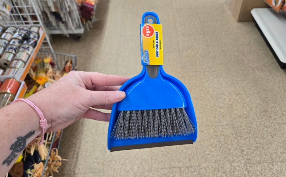 a mini broom and dustpan from dollar tree that can be used as one of your barbie accessories