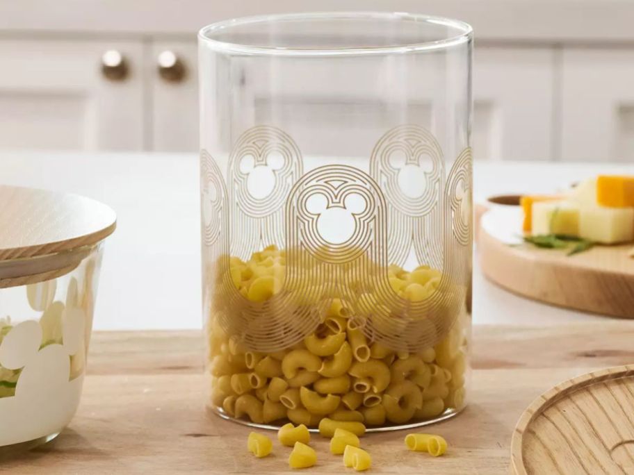 A Glass Mickey Icon Canister filled with pasta