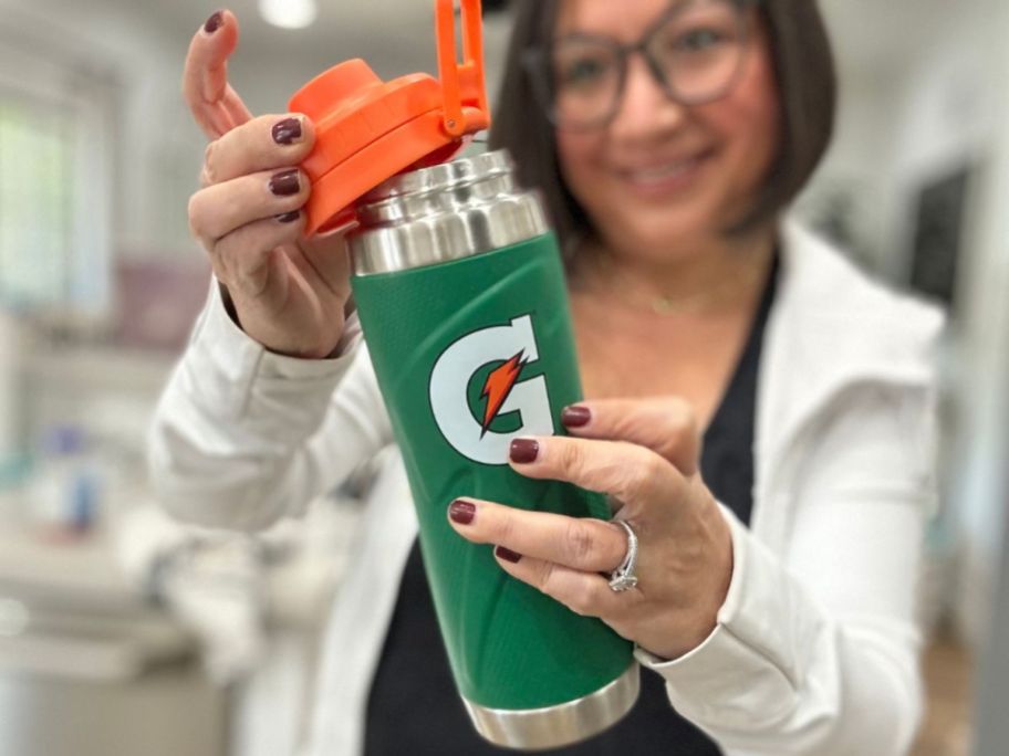 Woman holding a Gatorade Stainless Steel Water Bottle