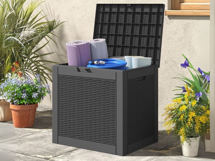 31-Gallon Outdoor Deck Box in Black on patio