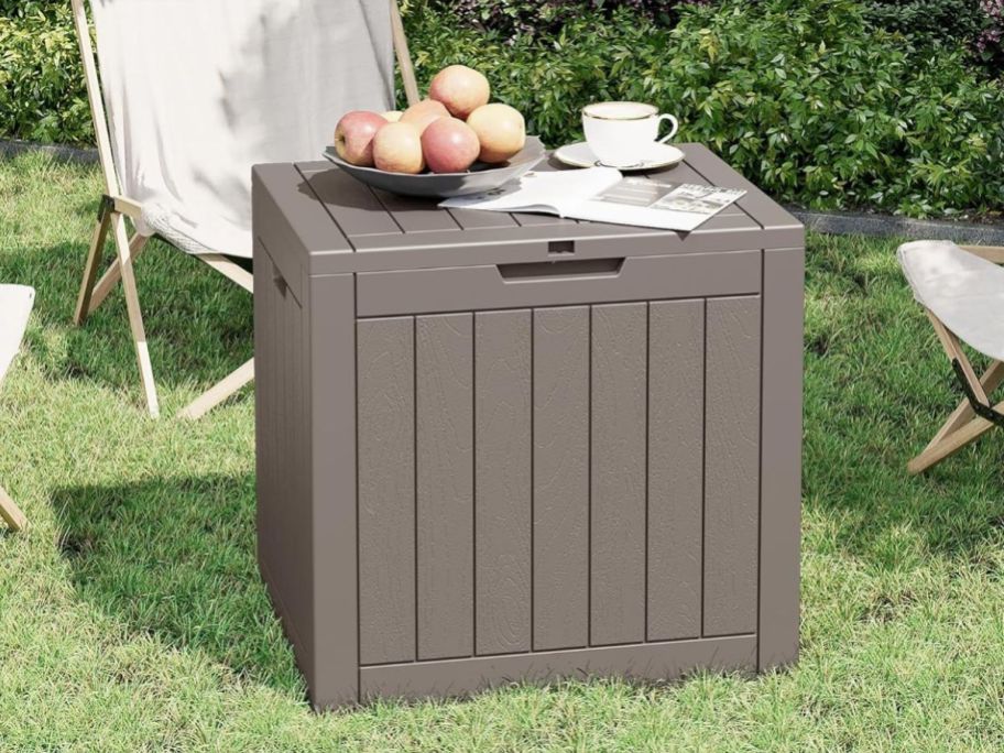 31-Gallon Outdoor Deck Box in Gray on grass