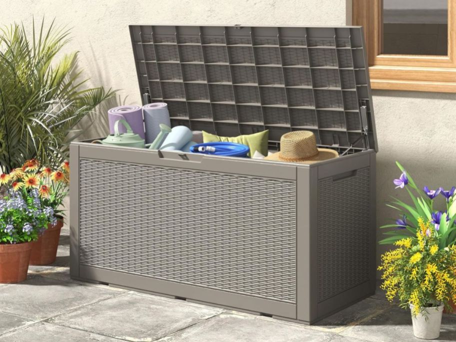 100-Gallon Outdoor Deck Box in Gray on patio