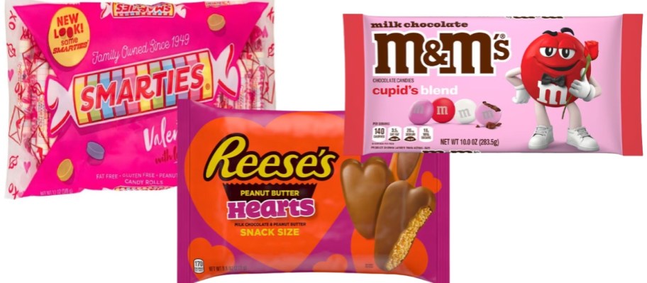 a bag of Valentine's Smarties candy, a bag of Reese's Peanut Butter Hearts candy, and a bag of Valentine's M&M's