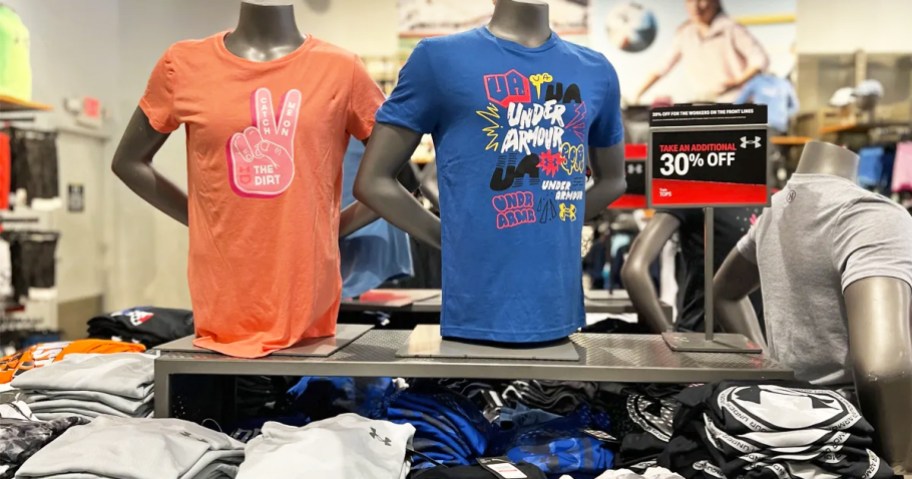 under armour tops display in store with 30% off <a href='https://tootightdu.com/product-category/new-arrivals-hair-essentials' target='_blank' rel='follow'>sale</a> tag” width=”912″ height=”479″></p>
<p>While supplies last, zoom over to <a href=