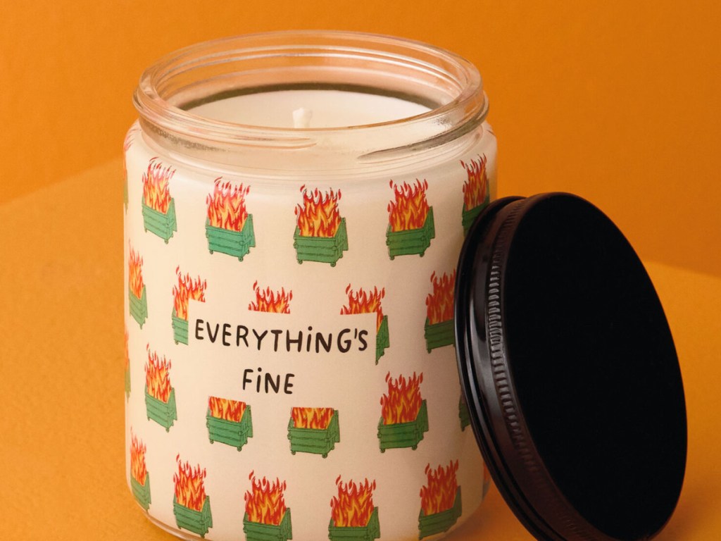 Everything's fine jar candle in front of orange background