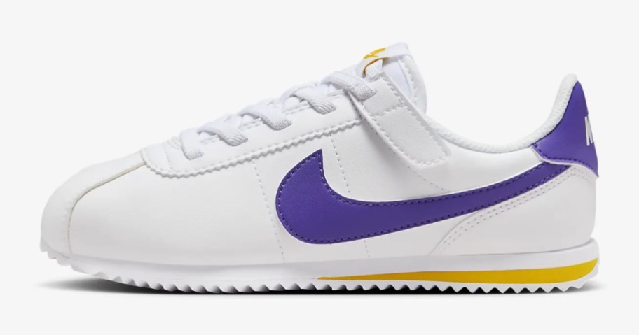 Nike Cortez style kids shoe in white with purple and yellow accents