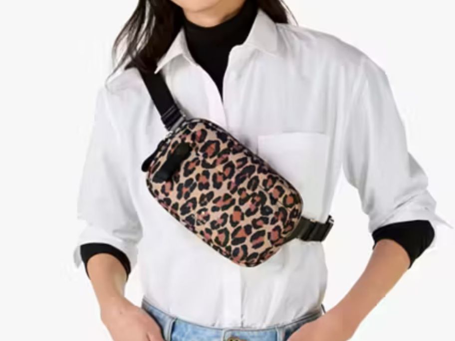 woman wearing Kate Spade Chelsea Spotted Leopard Belt Bag