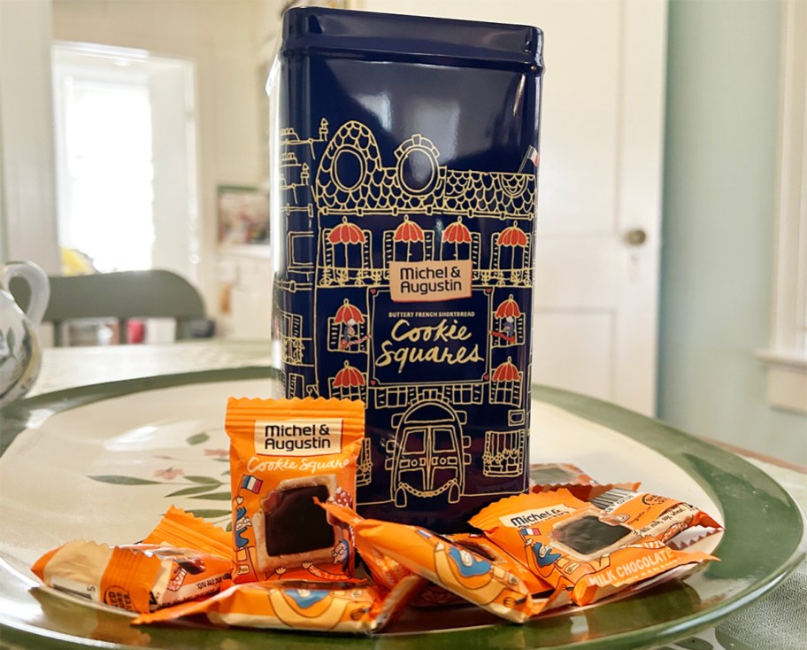 tin of cookies sitting on a table