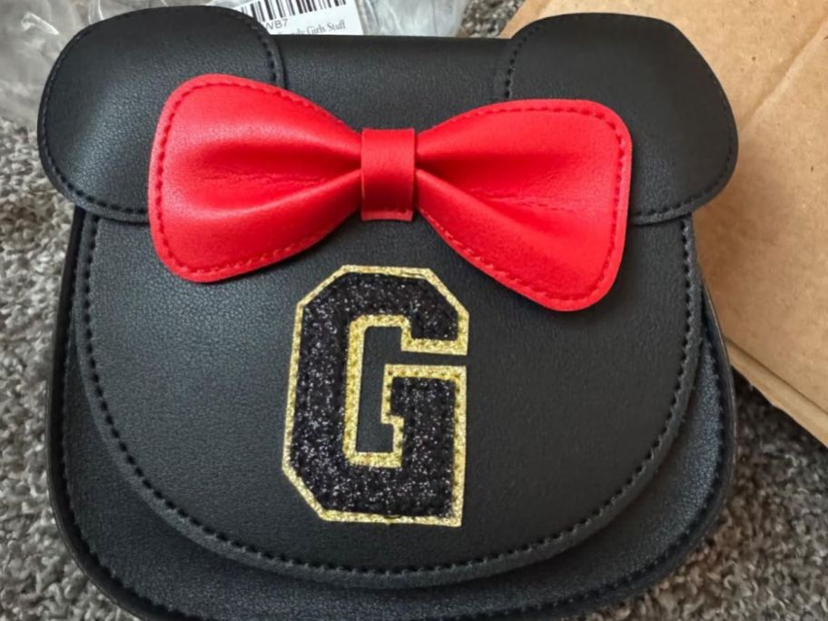 A black and red Minnie Mouse inspired initial purse 