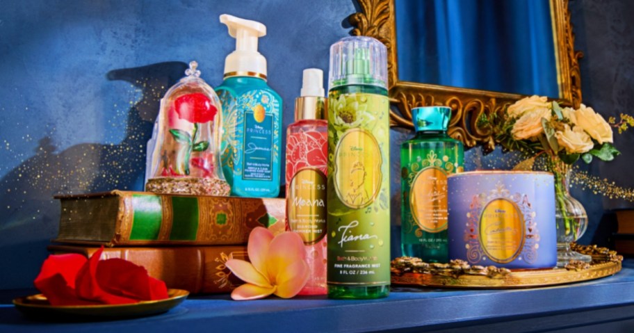 image showing various Bath & Body Works Disney Princess Collection items like hand soap, fragrance mist, shower gel, a candle, and more