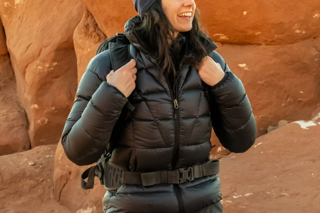 woman outside wearing black puffer jacket