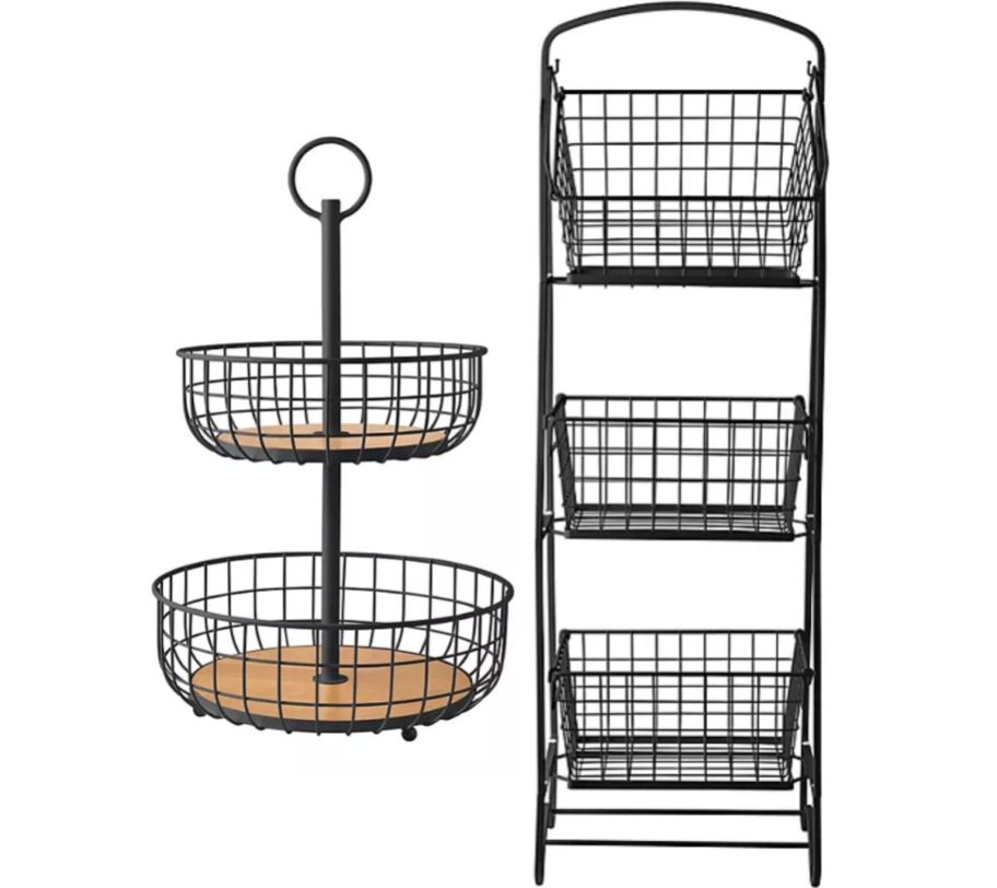 black metal wrought iron basket stands stock imagew