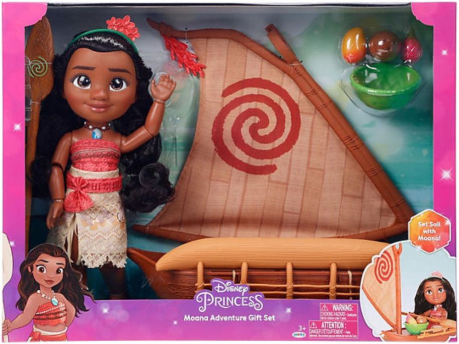 Stock image of a moana doll gift set with canoe