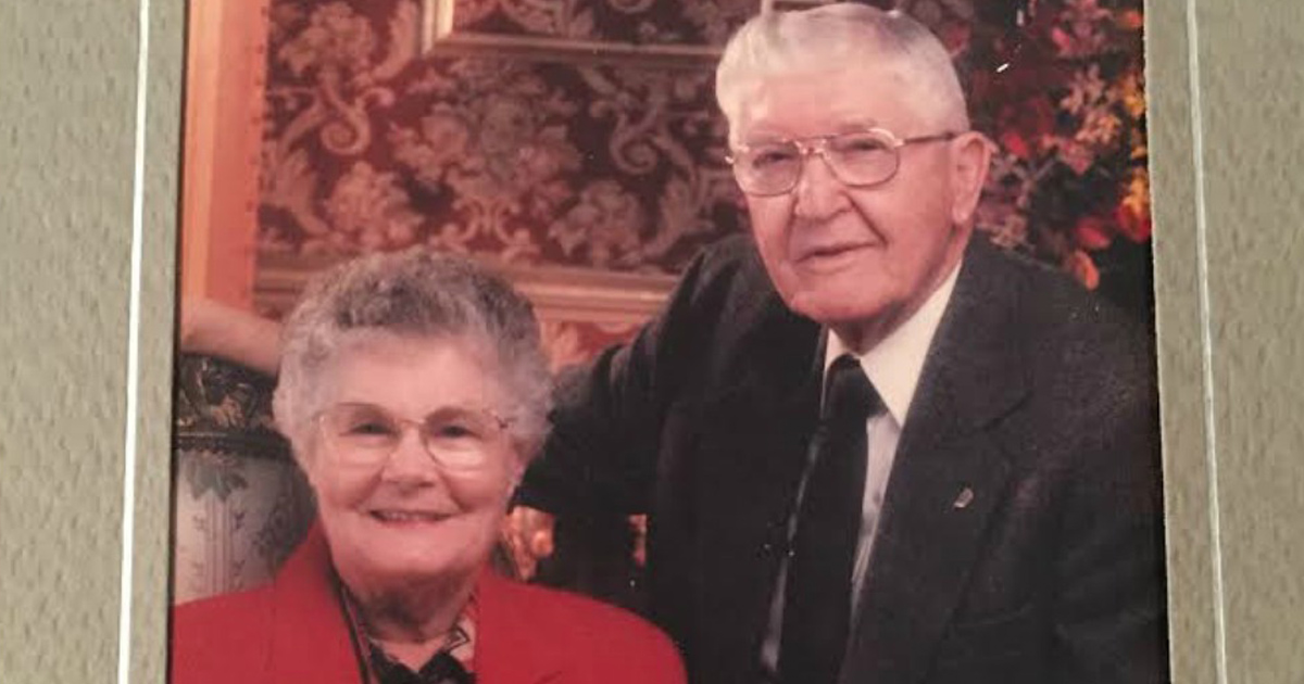 grandparents posing for photo